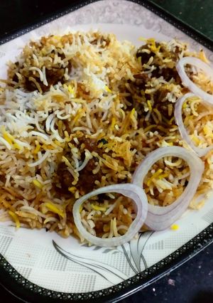 A picture of Easy Mutton biryani with homemade ingredients.