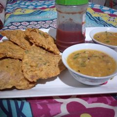 A picture of Left over Tandoor Naan with alu tarkari.