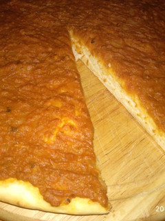 Una foto de Pizza de atún