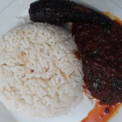 A picture of Rice with native stew.