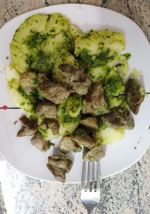 Una foto de Carne de cerdo con papas