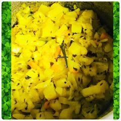 Dosa saag with dash of carrots A picture of Dosa saag with dash of carrots.