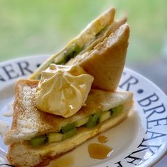 A picture of Maple Bread Toast with Kiwi and Vanilla Ice Cream.