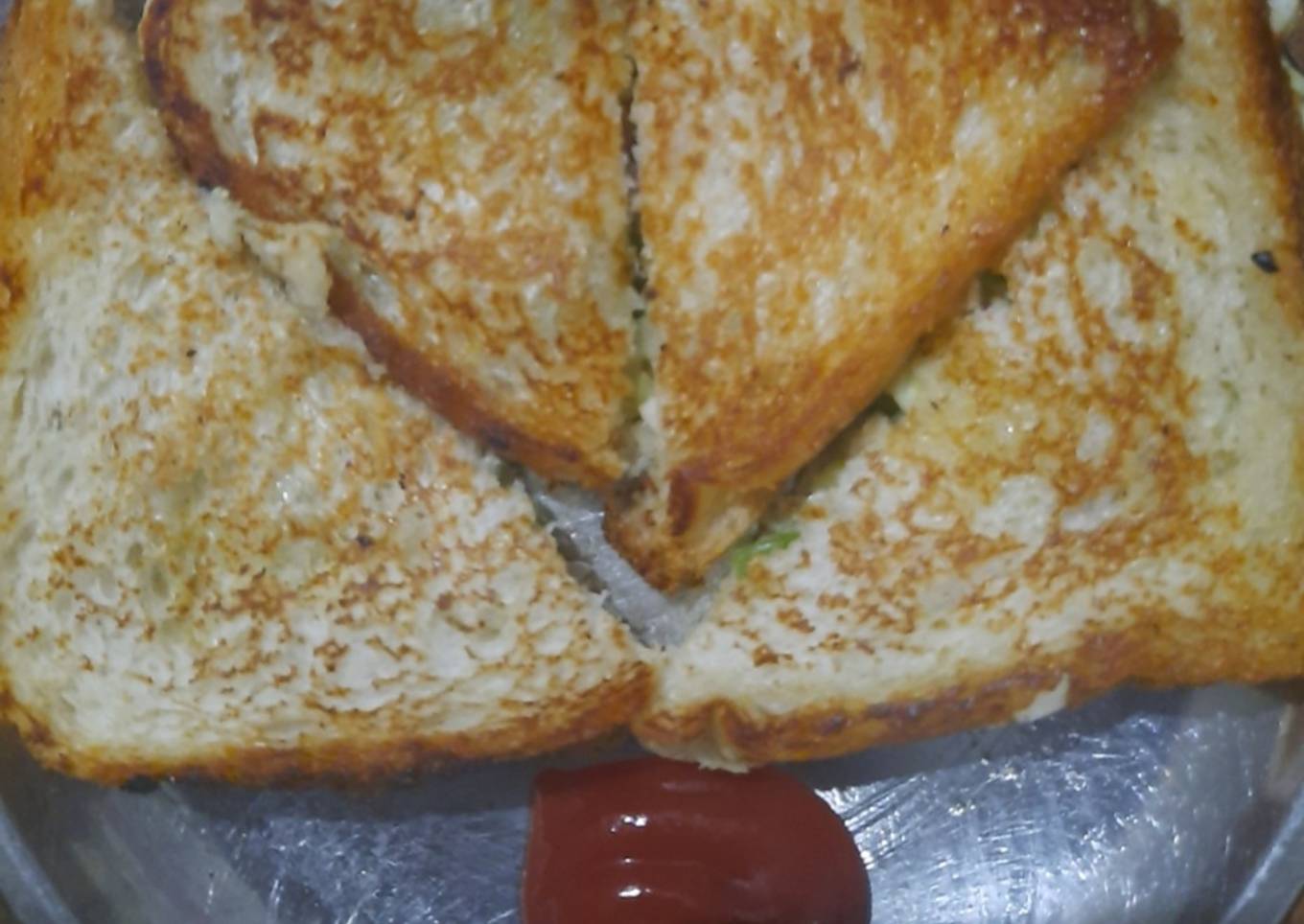 Spicy onion tomato masala sandwich