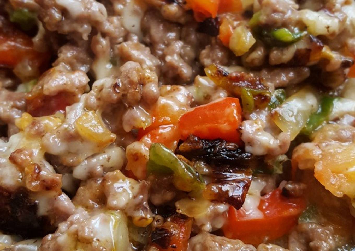 Salteado de carne picada con pimientos y queso