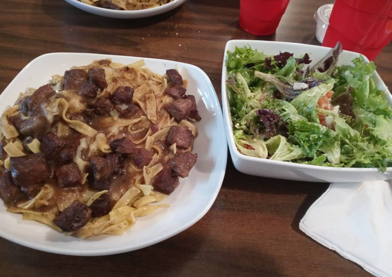Beef and noodles with spring salad