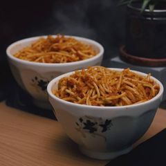 A picture of Spaghetti With Tuna & Chicken Sausage.