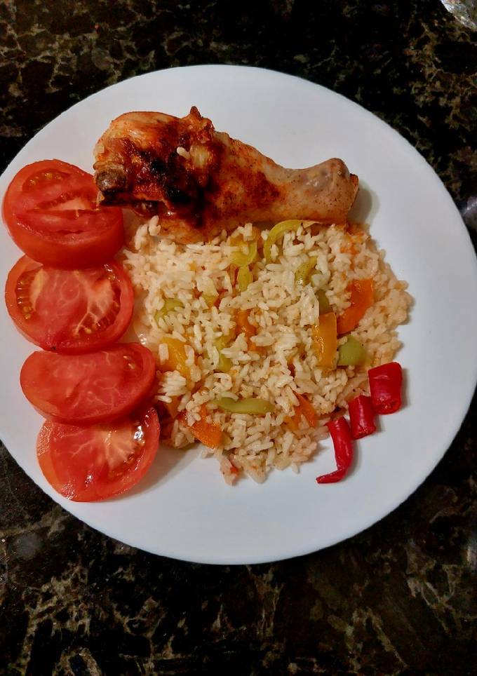Куряча гомілка, запечена з рисом та овочами