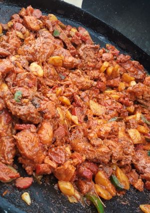 Una foto de Discada de alitas de pollo
