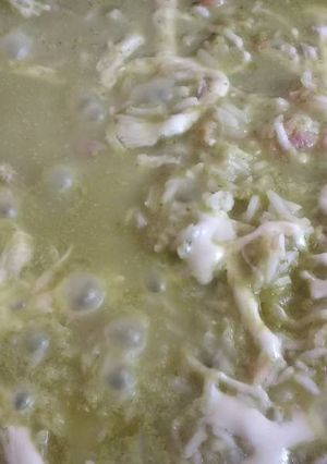 Una foto de Arroz verde con queso y jamón