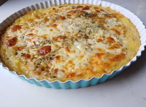 Una foto de Tarta con masa de Papa de Provolone y Cebolla