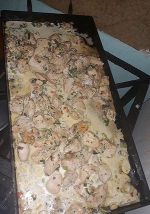 Una foto de Pollo con salsa de verdeo