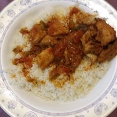 A picture of Rice and coconut fish.