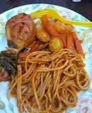 Pollo en achiote y Spaghetti