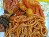 Pollo en achiote y Spaghetti