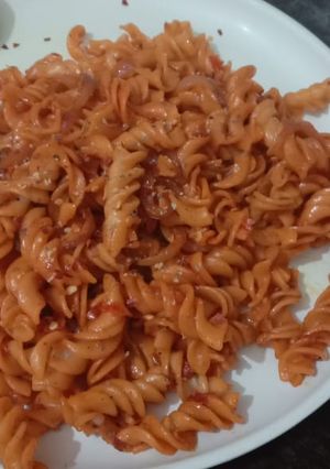 A picture of Red sauce pasta.