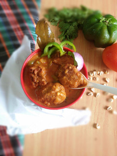A picture of Corn chicken meatball curry.