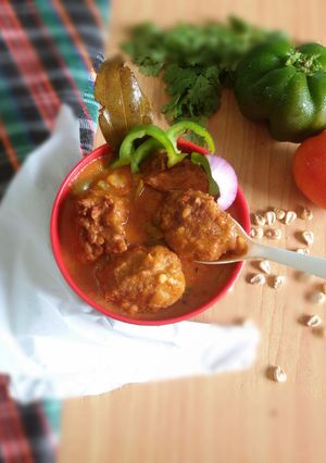 A picture of Corn chicken meatball curry.