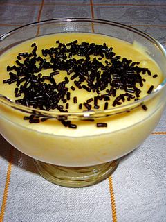 Una foto de Crema de polenta al aroma de limón y naranja