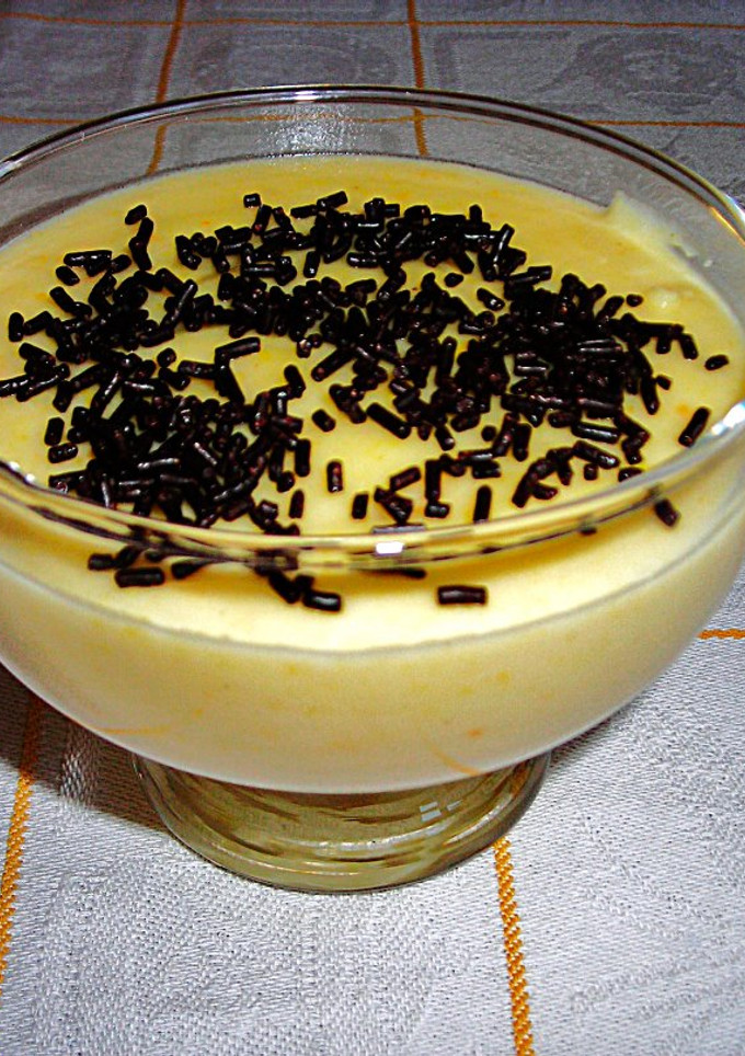 Una foto de Crema de polenta al aroma de limón y naranja
