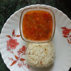 A picture of Jeera Rice with dal fry.