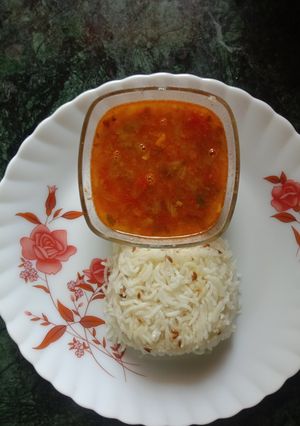 A picture of Jeera Rice with dal fry.