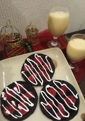 A picture of Chocolate pancakes with mango milkshake.