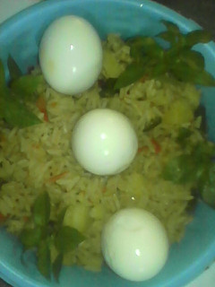 A picture of Fried rice an potatoes.