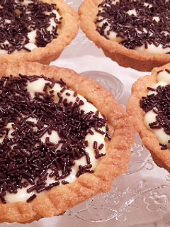 Una foto de Tartitas con Crema y Chocolate 🍫