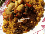 Fried couscous with spinach and egg sauce