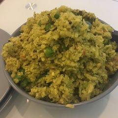 A picture of Green flattened rice.