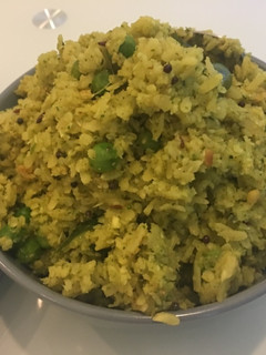A picture of Green flattened rice.