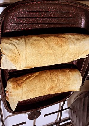 A picture of Beef and sausage Shawarma.
