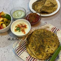 A picture of Scallion Niger seeds paratha /pyaaz ki patti aur bagh ke beej ka paratha.