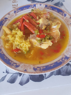Una foto de Arroz caldoso de dorada y marisco