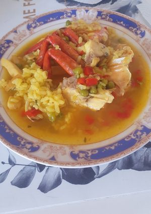 Una foto de Arroz caldoso de dorada y marisco