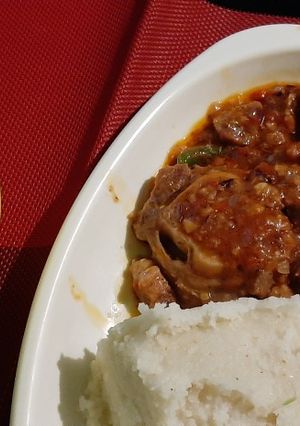 A picture of Stewed Goat With Ugali.