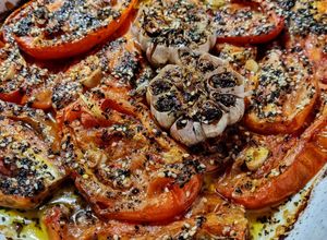 Una foto de TOMATES SAN Marzano🍅🍅 en Conserva al🧄Ajillo...!