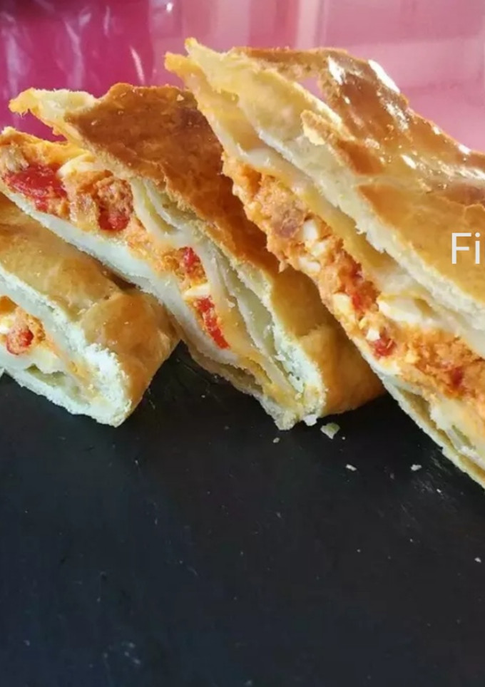 Una foto de Coca rellena con capas
