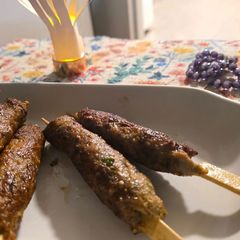A picture of Smoky chicken seekh kabab.