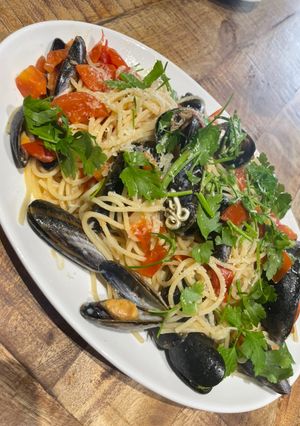A picture of Spaghetti of tomato and mussels.