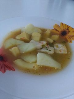 Una foto de Guiso de pota y perca