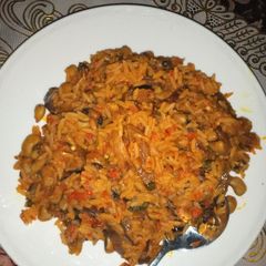 A picture of Palm oil jallof rice and beans.