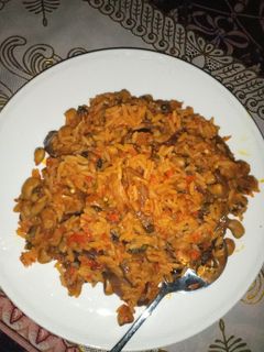 A picture of Palm oil jallof rice and beans.