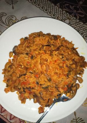 A picture of Palm oil jallof rice and beans.
