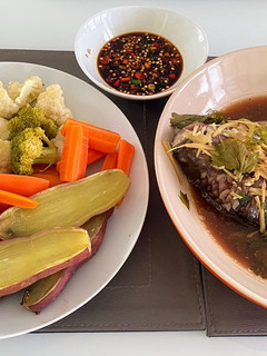 A picture of Steamed Tilapia with Ginger and Soy Sauce.