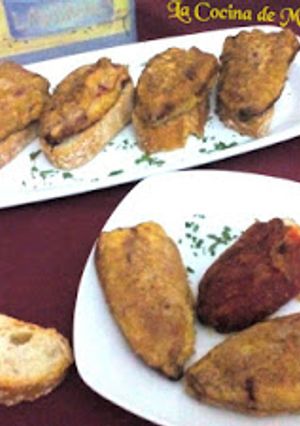 Una foto de Pimientos de piquillo enteros rellenos de atún