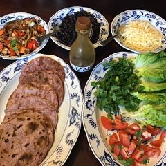 A picture of California Farm Chicken Tortilla with Lizano Style Salsa.