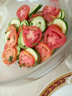 A picture of Tomato and cucumber salsa.