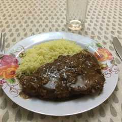 Una foto de Chuleta de cerdo en salsa agridulce de limón y jengibre